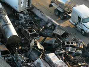 Supporting image for story: Crews clear wreckage after ‘superfog’ pile-ups leave at least seven dead