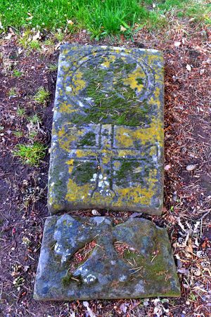 The emblem is clear to see on the tombstone