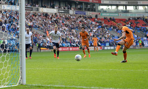 Conor Coady scores his penalty against Bolton.