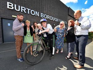 Supporting image for story: Teen smashes 100-mile charity bike ride for hospital that has cared for his mother
