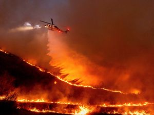 Supporting image for story: Firefighters hoping for break from fierce winds that have fuelled LA wildfires