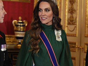 Supporting image for story: Kate matches gown to Nigerian colours as she meets country’s ruler and his wife