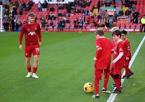 Thomas and the other mascots having a kick about at Anfield before Sunday's game