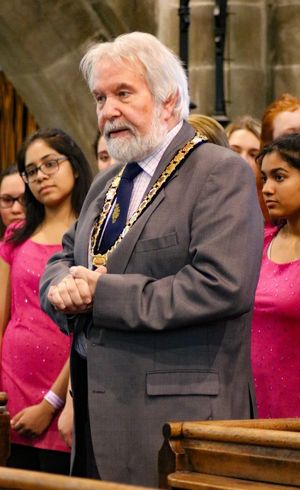 Llangollen Mayor, Jon Haddy, welcomes people to an opening service at St Collen's Church