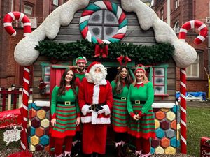 Supporting image for story: Father Christmas and his elves spread joy at children's hospital