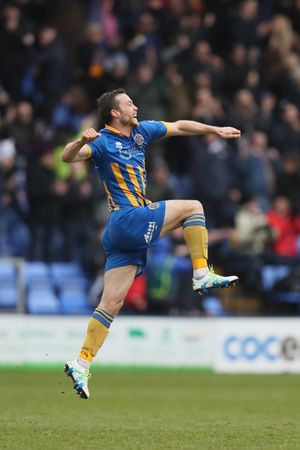 Shaun Whalley of Shrewsbury Town celebrates after scoring a goal to make it 3-1. (AMA)