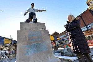 Councillor Judy Foster, cabinet member for regeneration, admires the statue