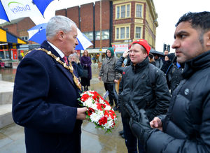 The Mayor chats to people who turned out for the wreath laying