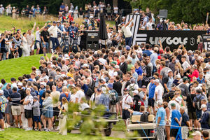 Fans watch Bryson DeChambeau tee off. Picture: LIV Golf