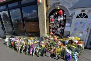 Blue ribbons and flowers left at the scene on Brownhills Hill Street where Ciaran Leigh Morris died