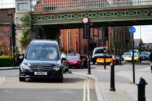 The funeral cortege arrives at Shrewsbury Abbey