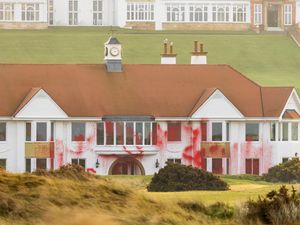 Supporting image for story: Two people appear at court accused of damaging Trump golf course