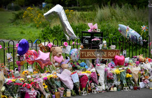 A sea of tributes have been left at the scene where Katniss died