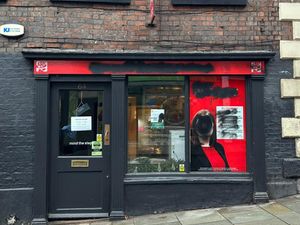 The office on Wyle Cop has been daubed with black paint.
