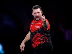 Jonny Clayton points during his match against Mickey Mansell at the PDC World Championship