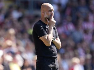 Manchester City manager Pep Guardiola on the touchline