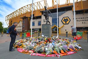 Tributes to former Wolves player Diogo Jota outside Molineux. Photo: Tim Thursfield