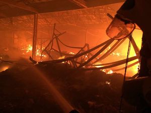 Firefighter Lee Baker took this action shot from inside the factory. Photo: @Lee_BakerFRS