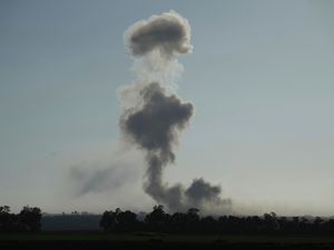 Supporting image for story: Israeli air strikes kill 14 Palestinians in Gaza, including 10 seeking food