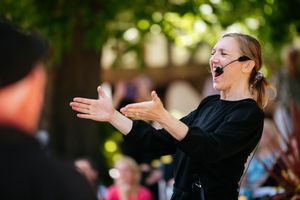 Rowan Richards at the  Rock Choir sing-a-thon outside of St Alkmunds Church in Shrewsbury. 