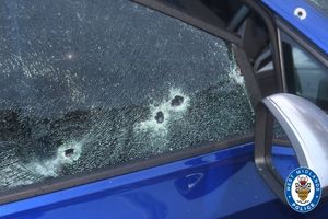 The car damaged in the drive-by shooting