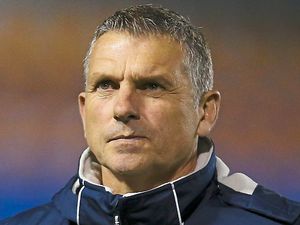 Supporting image for story: Shrewsbury boss John Askey admits the pressure stays on