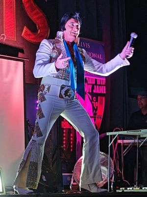 Andy James as Elvis