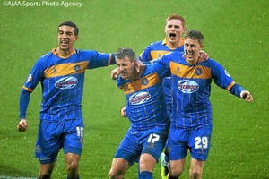 Paul Parry of Shrewsbury Town (17) celebrates after he scores a goal to make it 1-1