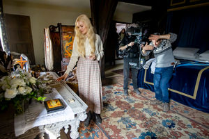 Director Simon Hunter chats to leading actress Charlotte Radford ahead of a scene at Upton Cressett Hall