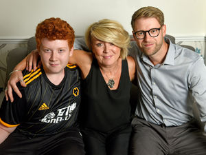 Supporting image for story: 'I gave him a big hug': Mother and son reunited with seaside rescuer