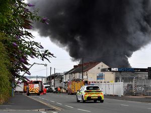 Supporting image for story: 9 shocking photos show black smoke pour into the sky from tyre supplier fire in Great Bridge