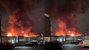 Video grabs show a fire burning at a fireworks storage unit in Walsall, West Midlands on December 4 2025.