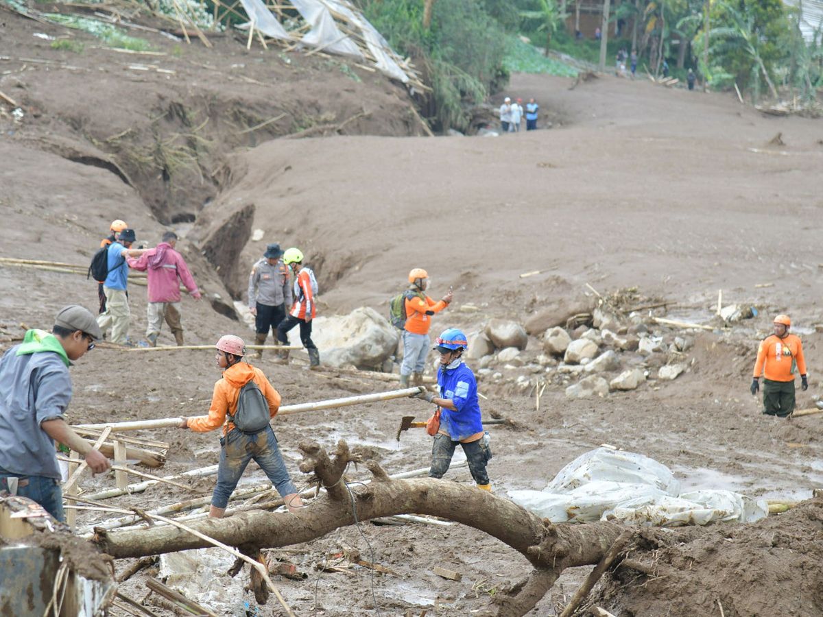 Dozens missing after landslide hits village in Indonesia