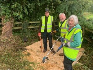 David Burton-Pye, Mike Blackshaw and Cathy Knight work to clear the Leper Well