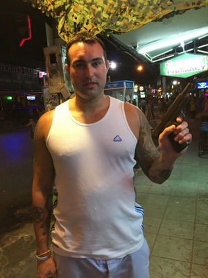 Christopher Jones posing with a gun