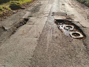 Potholes on the road between Chesterton and Burnhill Green, October 2024