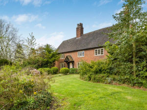 Supporting image for story: This beautiful Grade II-listed five-bedroom home was built 300 years ago - and now it's back on the market