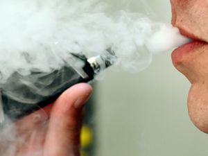 A man using a vape
