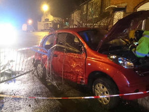 Supporting image for story: IN PICTURES: Car impaled on metal railings in Stourbridge smash