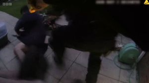 Orrey being arrested in the back garden. Picture: BBC documentary Murder 24/7