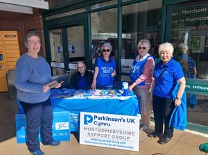Members of the local Parkinson's community raising awareness and fundraising outside Morrisons, Welshpool
