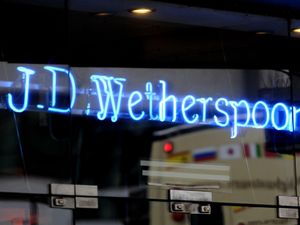 Supporting image for story: Wetherspoon warns over annual losses due to hiked wages and slow sales recovery