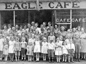 Supporting image for story: Cafe group celebrated war's end