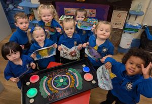 Little Trinity Nursery children delighted with their Diwali celebration creations.