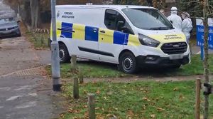 Police in Corporation Street, Stafford, after two children were pronounced dead early on Sunday