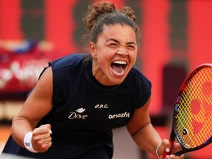 Jasmine Paolini celebrates beating Coco Gauff