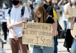 Protestors brought signs with a range of slogans on them