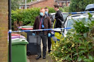 Police at the scene in Malinslee yesterday.