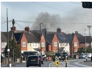 Supporting image for story: Fire crews rush to blaze in Wednesbury as fire engulfs garden fence sending 'grey and black smoke' billowing into sky