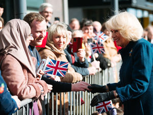 Supporting image for story: Flags wave and cheers go up as crowds welcome Queen Consort to Telford